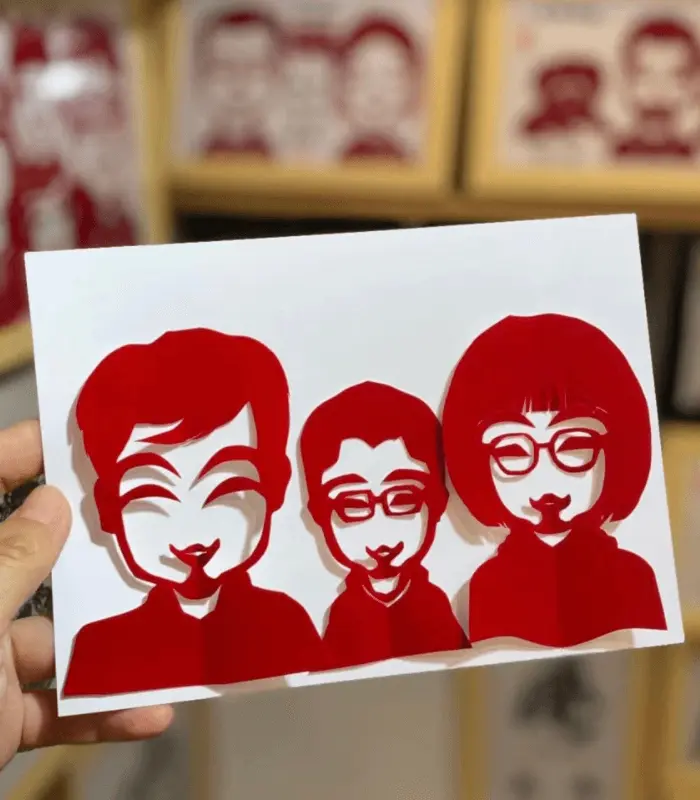 paper cutting family portrait