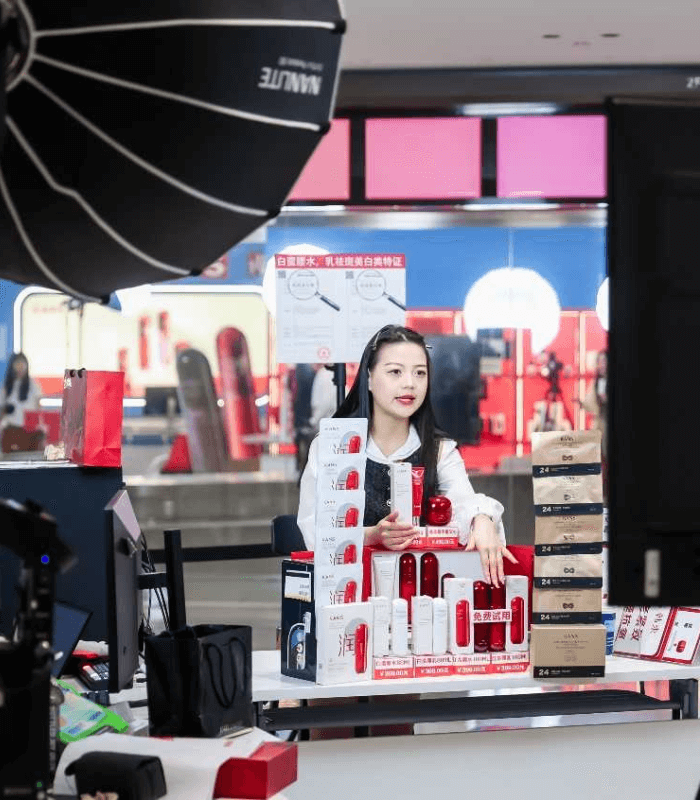 Female livestreamer selling makeup products at X27 live streaming mall