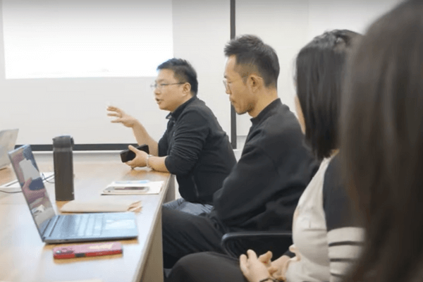 Glopen team collaborating to plan a personalized China history tour itinerary