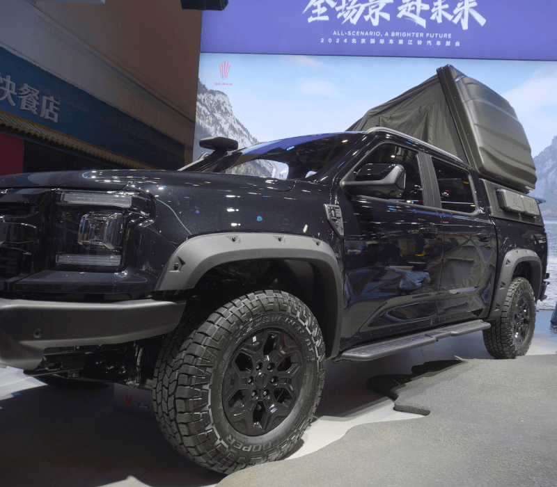 JMC Dadao black pickup truck showcased at a China auto show