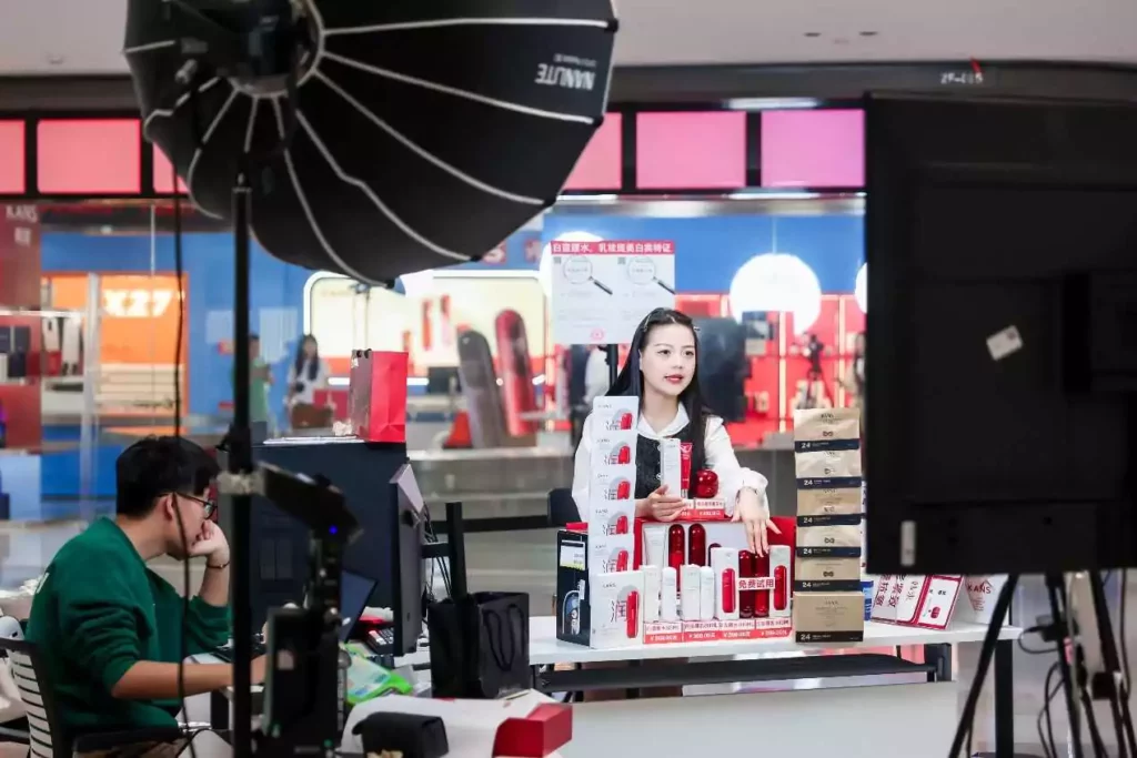 Behind the scenes of an MCN-recruited female livestreamer selling makeup products.